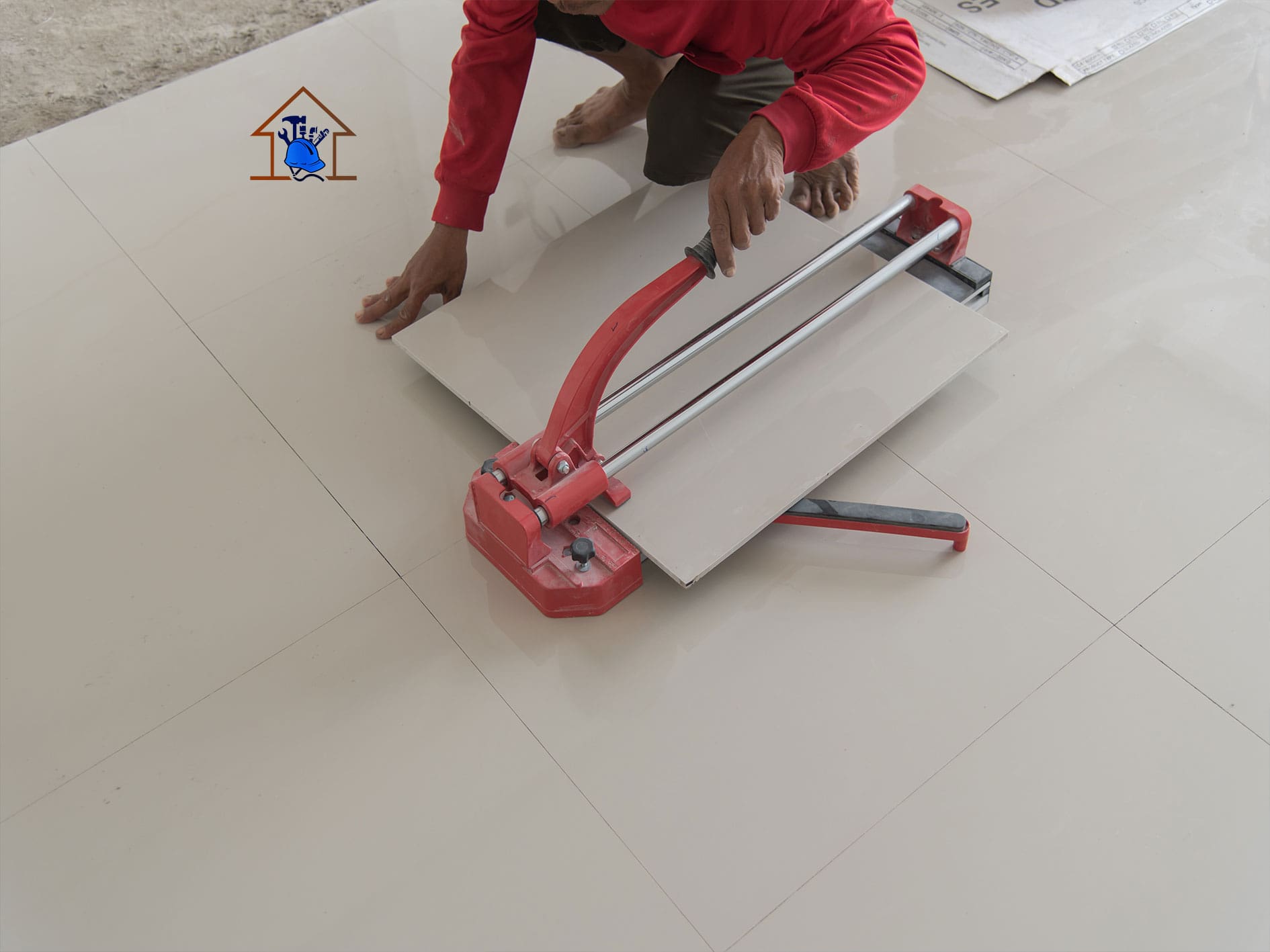 “Gaben Technologies tiler cutting floor tiles for precise installation in a Ghanaian home”